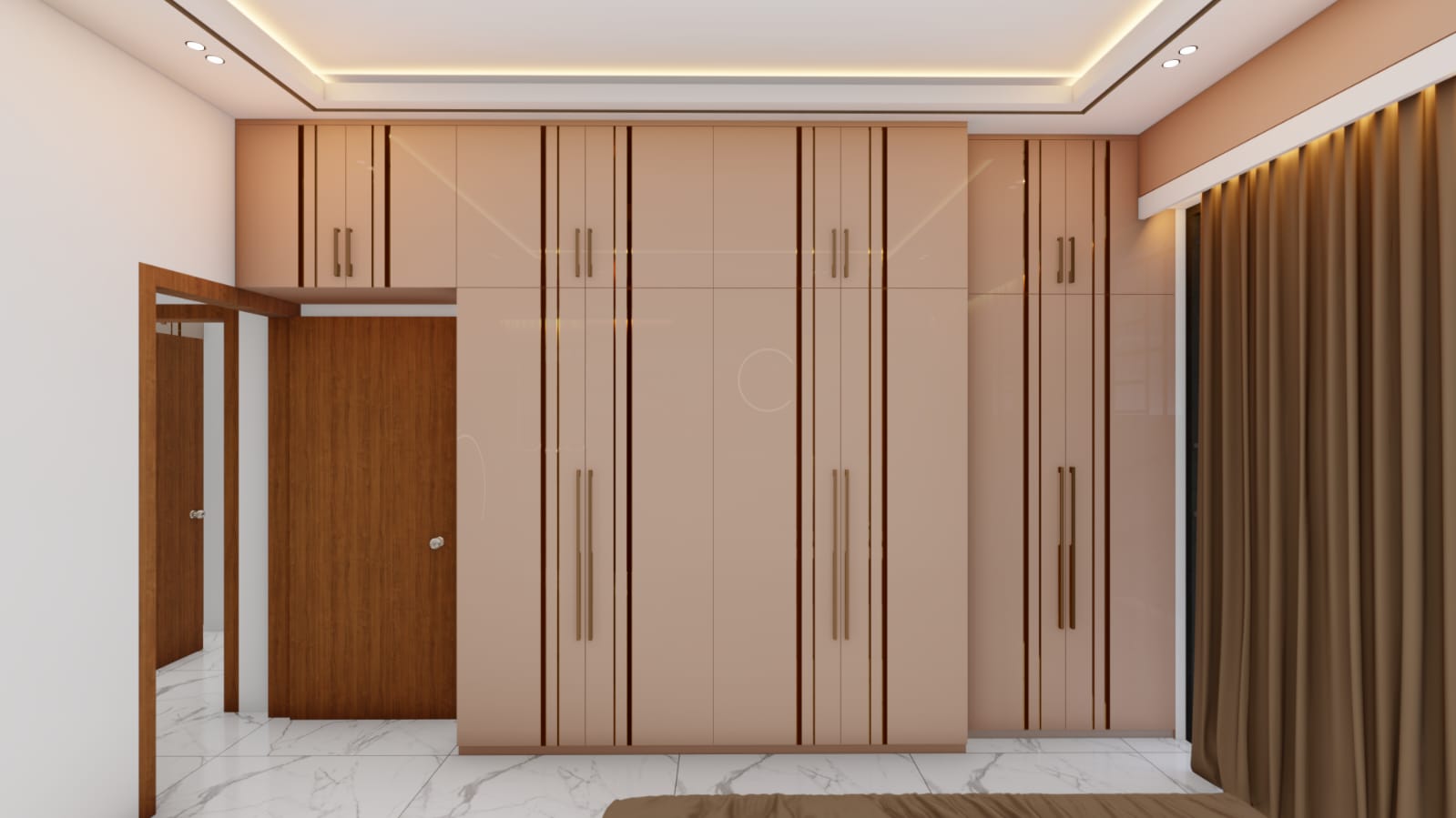 Custom fitted wardrobes in glossy blush finish with gold handles by Suad Architects